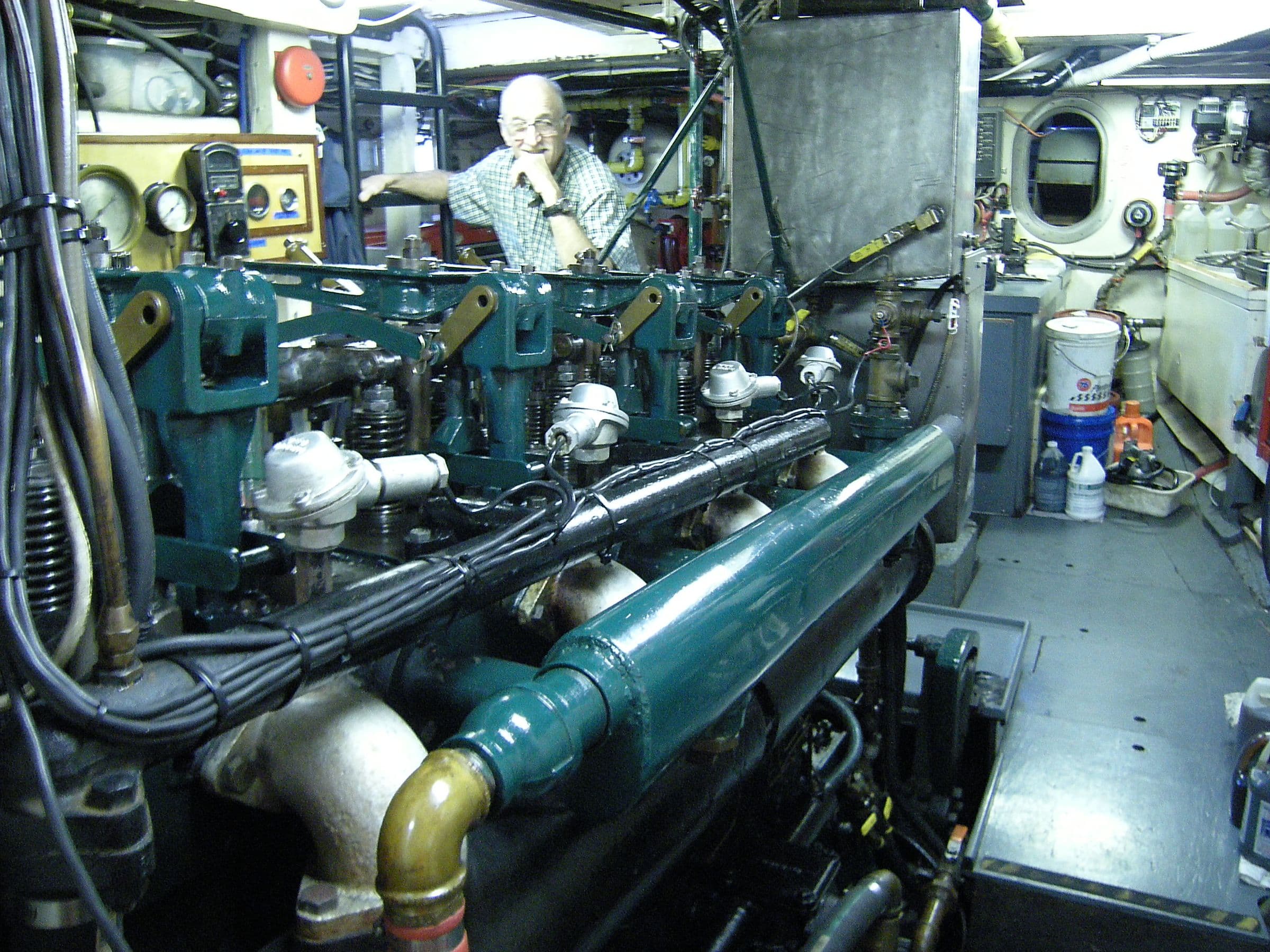 Yacht engine room: main engine and pipework